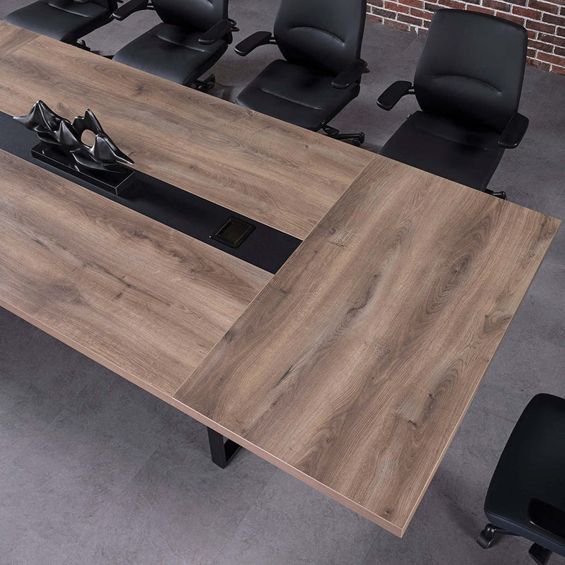 Vantage 2400 Boardroom Table top view showing Warm Oak surface and central cable panel