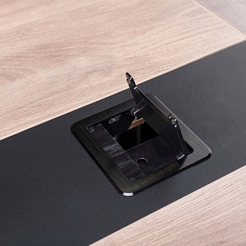 Close-up of the Vantage boardroom table open cable grommet in the tabletop