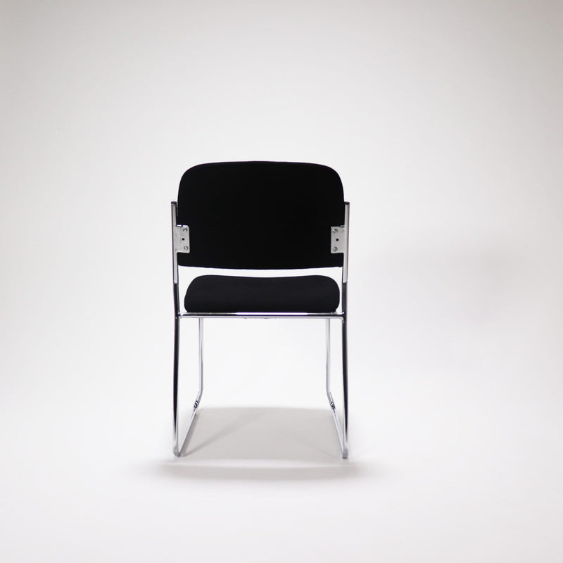 black fabric visitor chair with chrome sled base