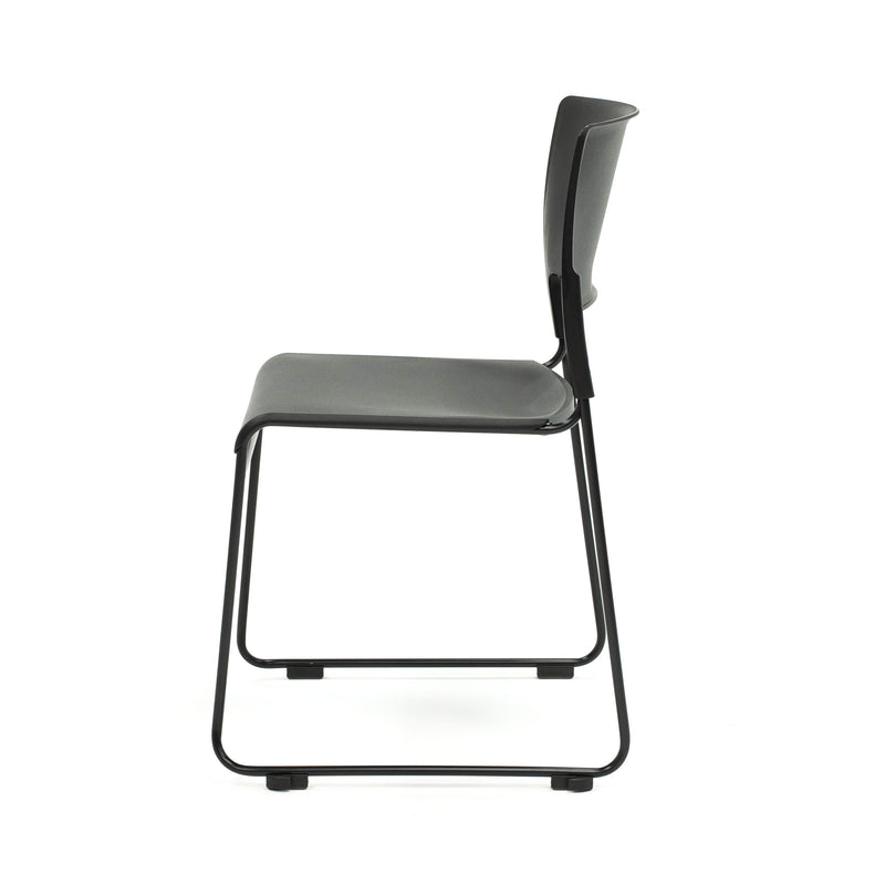 Black stacking chair back view with polypropylene backrest