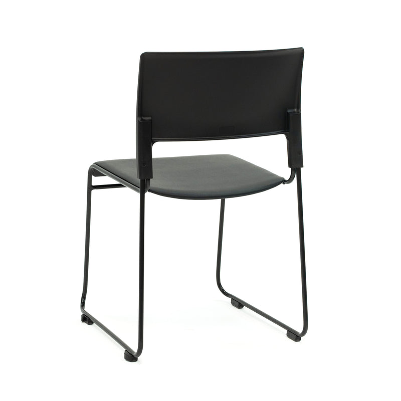 Black padded stacking chair with sled base frame
