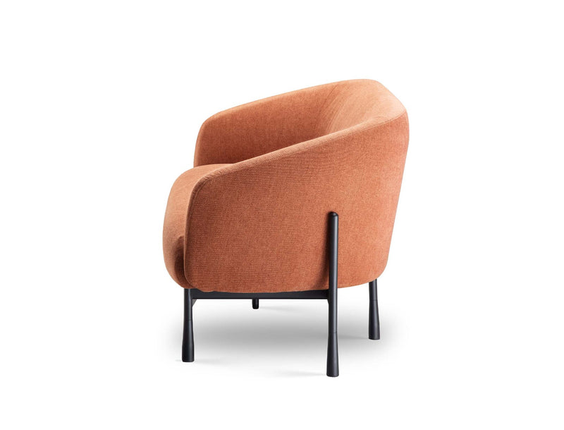 Rear corner view of Cosmos lounge showing Rust fabric upholstery